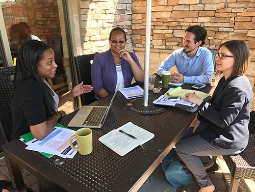 As part of CHACE's effort to engage candidates, Sim Wimbush, Molly Jacobson, and Zack Miller from the Virginia Housing Alliance meet with Delegate Jennifer Carroll Foy (D), who won her seat in November 2017.