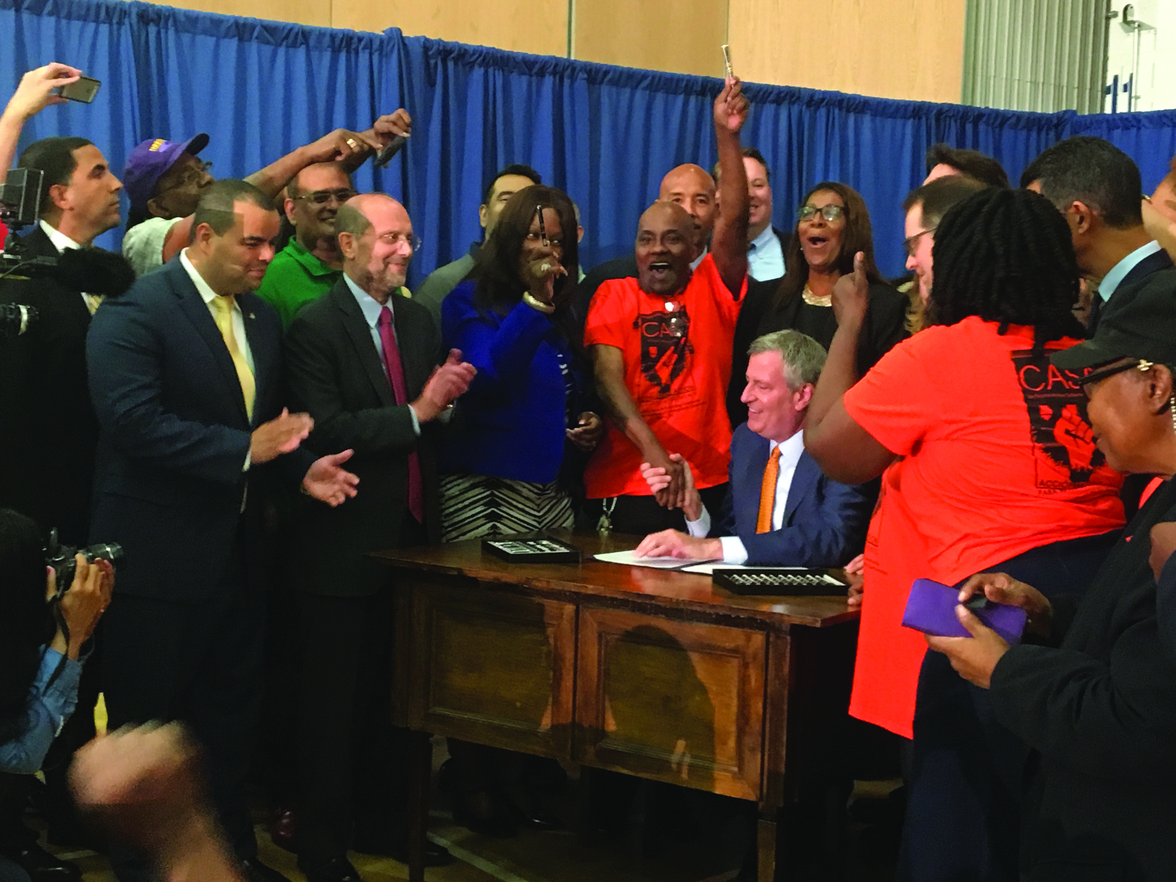 Advocates celebrate Mayor Bill DeBlasio signing New York’s new Right to Counsel law