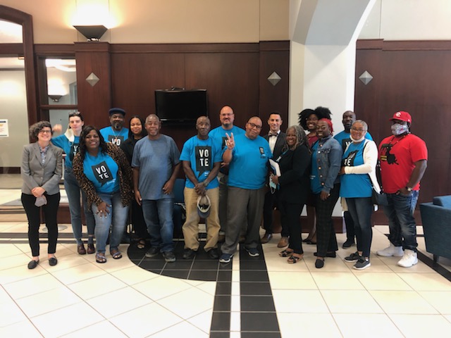 Advocates celebrate after the Louisiana Housing Corporation’s unanimous passage of its inclusive criminal background screening policy in 2021.