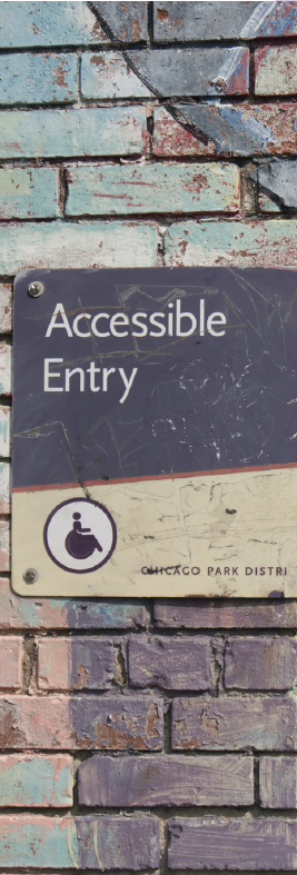 PHOTO BY DANIEL ALI ON UNSPLASH. SIGN ON BRICK WALL LABELED “ACCESSIBLE ENTRY” Housing & Disability Justice FALL VOLUME