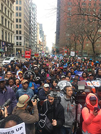 Thousands gather to here speakers rally support for equitable tax reform and tax transparency of public officials.