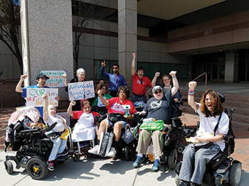 MassADAPT rally outside of HUD’s offices in Boston