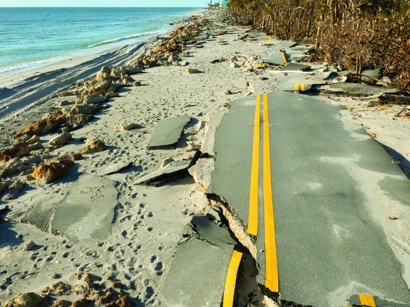 An eroded highway by water.