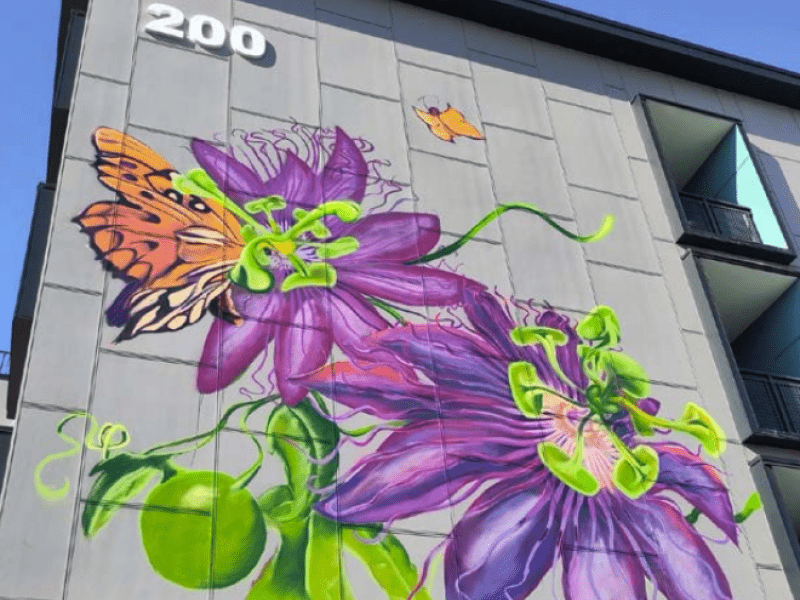 Residential building with a flower mural.